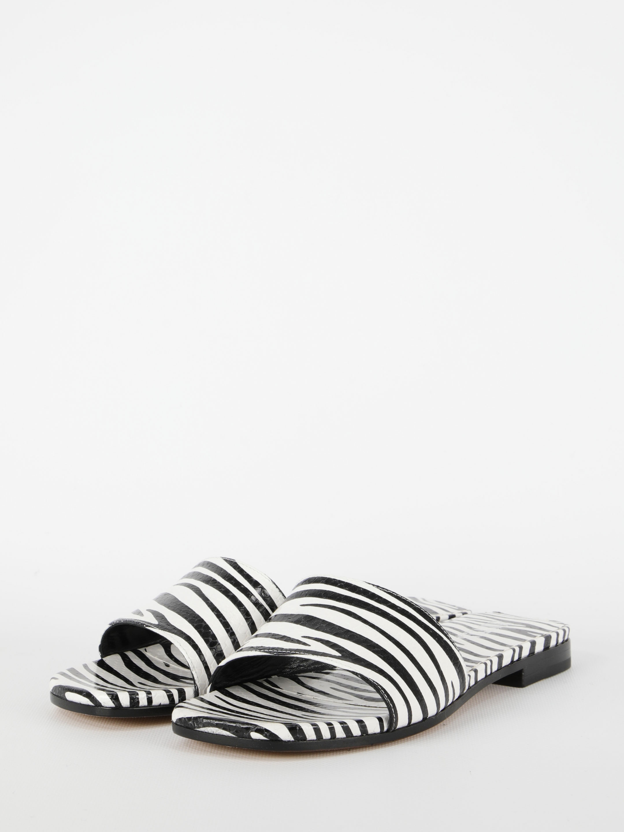 Zebra-print flat sandals hover