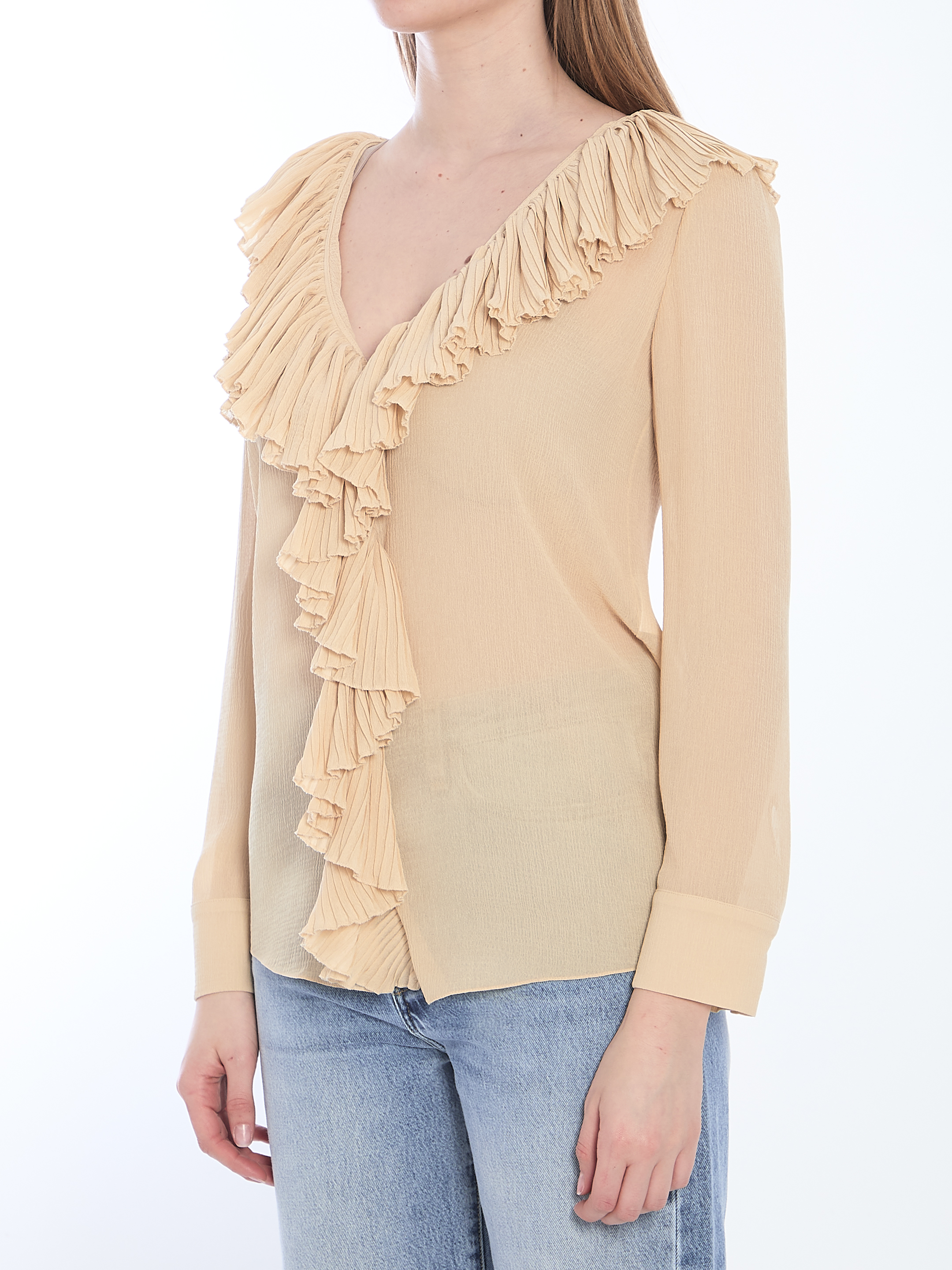 Ruffled blouse hover