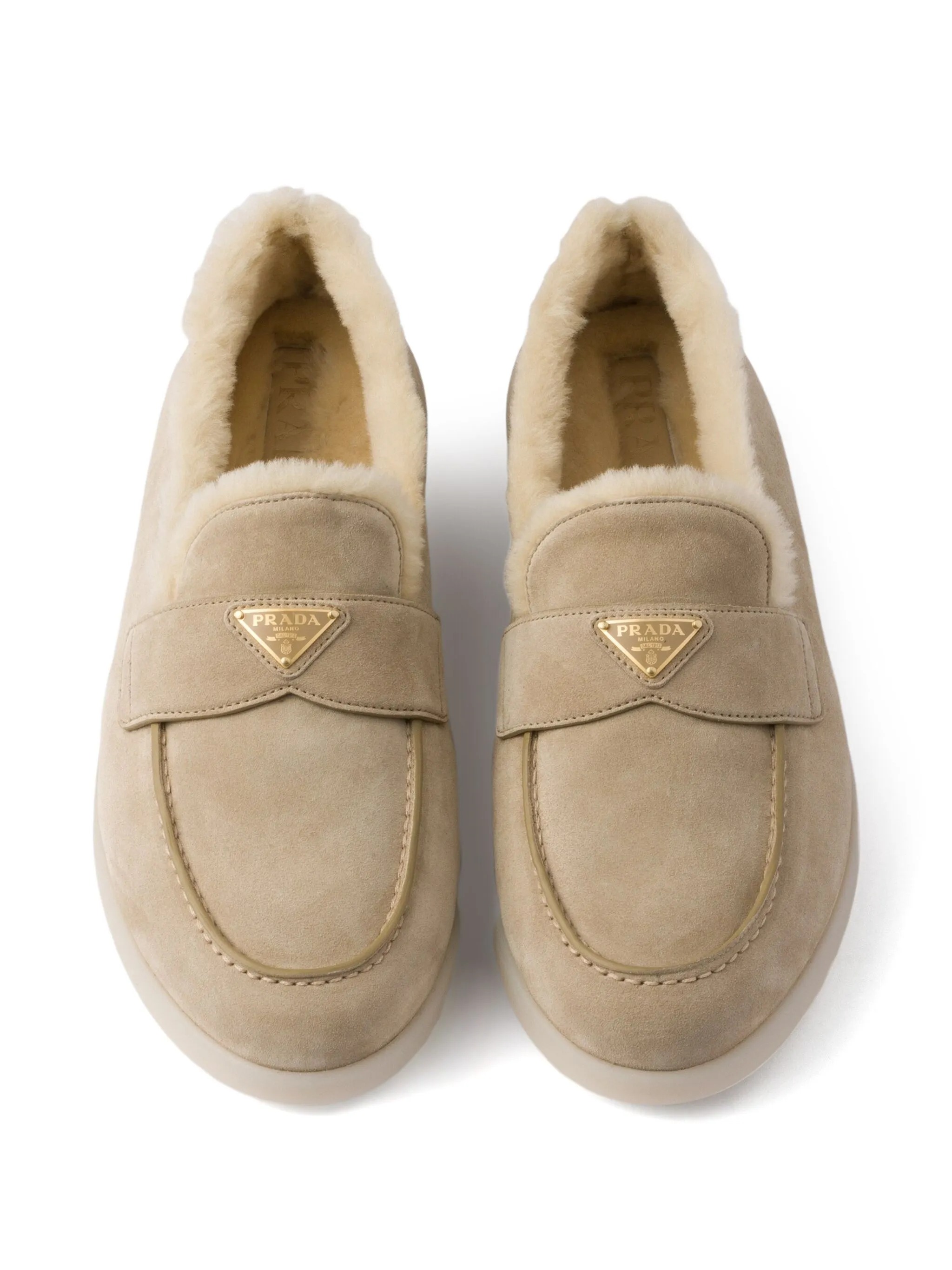 Loafers in leather and shearling hover
